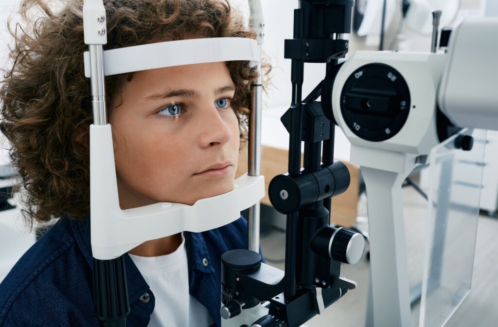 Child undergoing an eye exam, an important step in detecting and managing myopia.